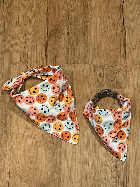 multicolored smiley faces on white background dog bandana